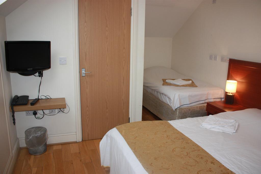 Corner House Hotel London Værelse billede